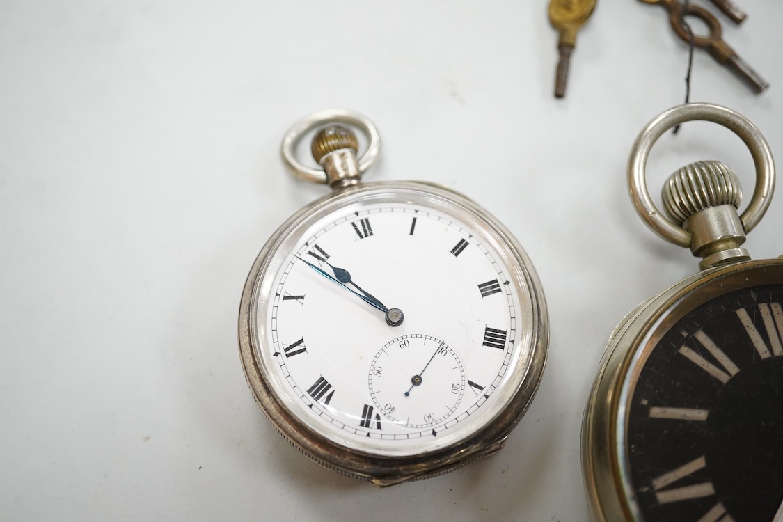 A collection of open faced pocket keyless watches to include a black faced Military pocket watch signed Carley & Clemence A1386, stamped verso GS MK. D 1386another black faced pocket watch, a silver open faced pocket wat